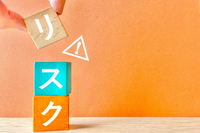 リスクのブロックを並べる手元の様子